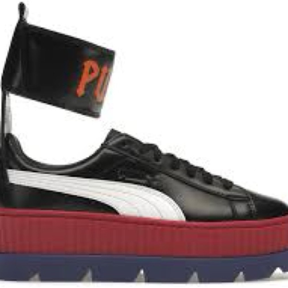 Puma Black Sneakers with Red and Blue Sole